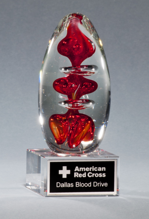 Egg-Shaped Red Art Glass Award Clear Glass Base